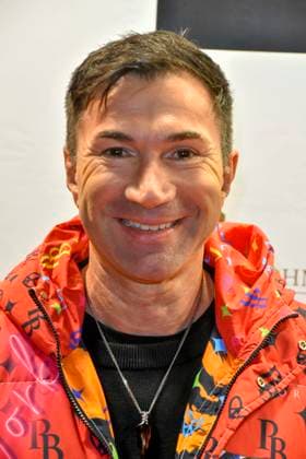 ABBkoeln Lucas Cordalis German singer wears a red colored coat as a guest at Katys X Mas Wonderland Christmas Party at Wolkenburg on 02 12 2025 in Cologne NRW Germany