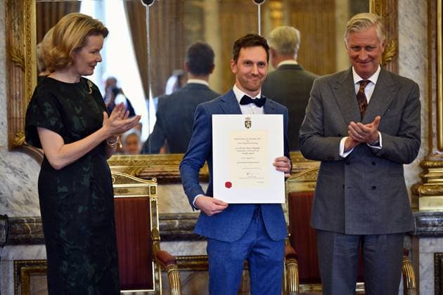 Queen Mathilde of Belgium, Davy Depaepe of Freddy Sport and King Philippe - Filip of Belgium pose for the photographer during a royal reception with the newly appointed suppliers holding a Royal warrant of appointment (Brevet van Hofleverancier - Brevet de Fournisseurs de la cour), at the Royal Palace, in Brussels, Wednesday 03 December 2025.  ERICxLALMAND 146116351