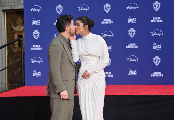 Nick Jonas is joined by his wife Priyanka Chopra at the Jonas Brothers hand and footprint ceremony immortalizing them in the forecourt of the TCL Chinese Theatre (formerly Grauman s) in the Hollywood section of Los Angeles on Wednesday, December 3, 2025.  LAP2025120322 JIMxRUYMEN
