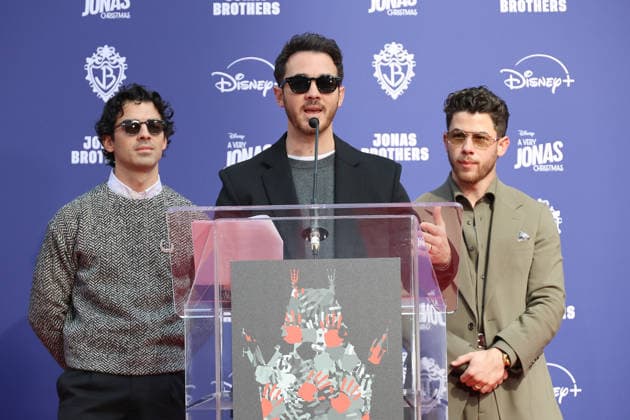 December 3, 2025, Los Angeles, California, USA: Joe Jonas, Kevin Jonas, Nick Jonas at a ceremony honoring the Jonas Brothers with hand and foot prints at the TCL Chinese Theatre IMAX. Los Angeles USA - ZUMAg107 20251203_zep_g107_006 Copyright: xNinaxPrommerx