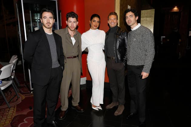 December 3, 2025, Los Angeles, California, USA: Kevin Jonas, Nick Jonas, Priyanka Chopra Jonas, Ryan Seacrest, Joe Jonas at a ceremony honoring the Jonas Brothers with hand and foot prints at the TCL Chinese Theatre IMAX. Los Angeles USA - ZUMAg107 20251203_zep_g107_013 Copyright: xNinaxPrommerx