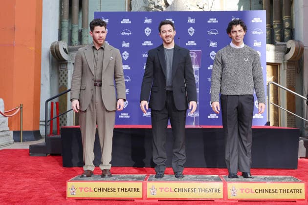 December 3, 2025, Los Angeles, California, USA: Nick Jonas, Kevin Jonas, Joe Jonas at a ceremony honoring the Jonas Brothers with hand and foot prints at the TCL Chinese Theatre IMAX. Los Angeles USA - ZUMAg107 20251203_zep_g107_021 Copyright: xNinaxPrommerx