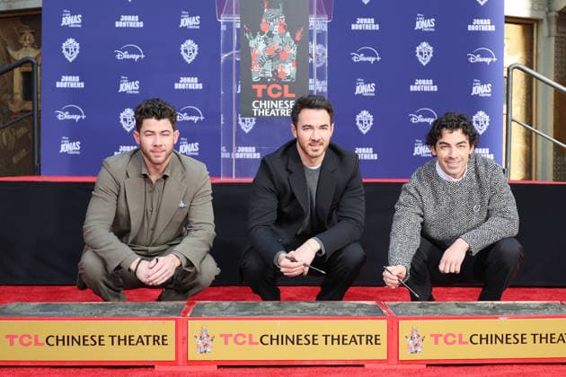 December 3, 2025, Los Angeles, California, USA: Nick Jonas, Kevin Jonas, Joe Jonas at a ceremony honoring the Jonas Brothers with hand and foot prints at the TCL Chinese Theatre IMAX. Los Angeles USA - ZUMAg107 20251203_zep_g107_022 Copyright: xNinaxPrommerx