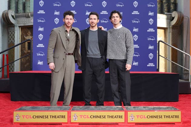 December 3, 2025, Los Angeles, California, USA: Nick Jonas, Kevin Jonas, Joe Jonas at a ceremony honoring the Jonas Brothers with hand and foot prints at the TCL Chinese Theatre IMAX. Los Angeles USA - ZUMAg107 20251203_zep_g107_025 Copyright: xNinaxPrommerx