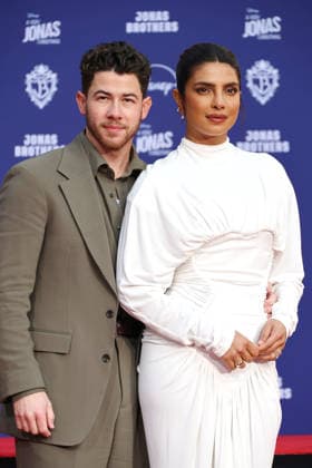 December 3, 2025, Los Angeles, California, USA: Nick Jonas, Priyanka Chopra Jonas at a ceremony honoring the Jonas Brothers with hand and foot prints at the TCL Chinese Theatre IMAX. Los Angeles USA - ZUMAg107 20251203_zep_g107_028 Copyright: xNinaxPrommerx