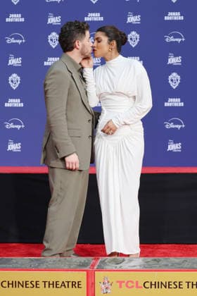 December 3, 2025, Los Angeles, California, USA: Nick Jonas, Priyanka Chopra Jonas at a ceremony honoring the Jonas Brothers with hand and foot prints at the TCL Chinese Theatre IMAX. Los Angeles USA - ZUMAg107 20251203_zep_g107_029 Copyright: xNinaxPrommerx