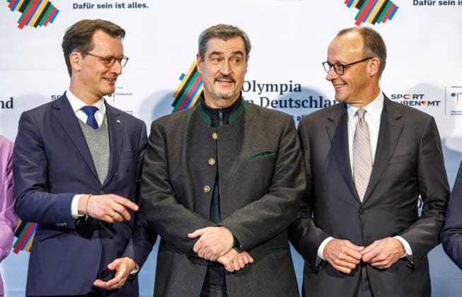 Signing of the agreement on the Olympic bid Signing of the agreement on the Olympic bid by Federal Chancellor Friedrich Merz and the President of the German Olympic Sports Confederation DOSB , Thomas Weikert, as well as the heads of government of the participating states and cities, in Berlin on 4 12 2025 r l Federa