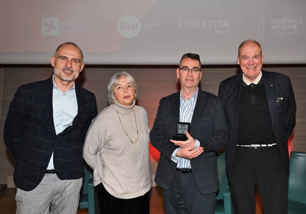 Milan, Italy Mick Herron receives the Raymond Chandler Award at the Noir in Festival with a masterclass at IULM. In the photo: Mick Herron Award during his speech with Adrian Wootton OBE, Chief Executive of Film London, Fabio Vittorini, lecturer at IULM, and Marina Fabbri, Co-director at Noir in Festival.  Copyright: xNickxZonnax xipa-agency.netx xNickxZonnax IPA_Agency_IPA68737784
