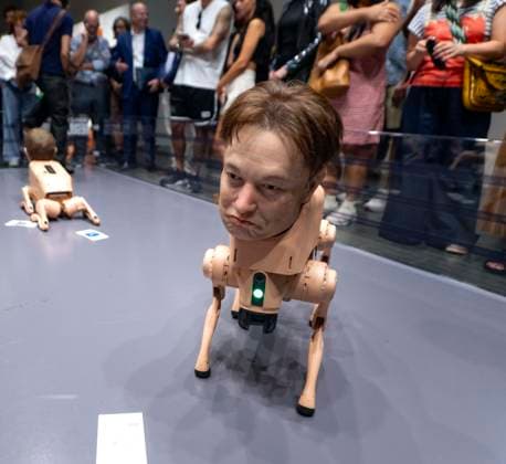 December 04, 2025 - Miami Beach, Florida, USA - A hyper-realistic ELON MUSK robotic dog is one of a handful of canine sculptures of billionaires entitled Regular Animals by artist Mike Winkelmann (AKA Beeple ) on display at the 2025 Art Basel Miami Beach Miami Beach USA - ZUMAce6_ 20251204_zaf_ce6_002 Copyright: xBrianxCahnx