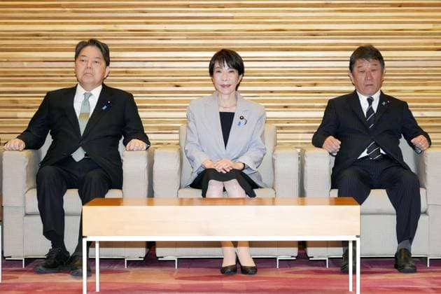 Japan PM Takaichi Japanese Prime Minister Sanae Takaichi (C) waits to attend a Cabinet meeting at her office in Tokyo on Dec. 5, 2025.  A14AA0005089330P