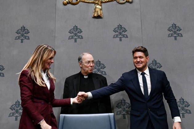 December 5, 2025, Vatican City, Rome, Vatican: Press conference for the Concert with the Poor. Pictured are Don Marco Frisina, Serena Autieri, and Michael BubloÂ¨. Vatican City, Dec 5th, 2025 Vatican City Vatican  - ZUMAa289 20251205_zia_a289_094 Copyright: xMariaxLauraxAntonelli Agfx