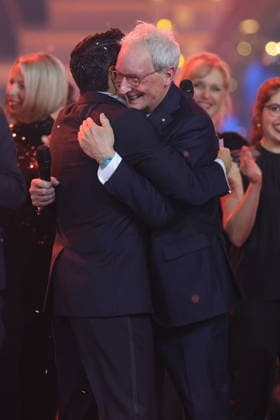 The Great Christmas Show 2025 Presenter Giovanni Zarrella hugs Johannes Zurnieden Founder and Managing Director of Bonn-based cruise operator Phoenix Reisen , who has just donated 1.2 million euros on behalf of Phoenix Reisen The Great Christmas Show presented by Giovanni Zarrella ZDF Live broadcast from 04 12 2025 in the Baden A