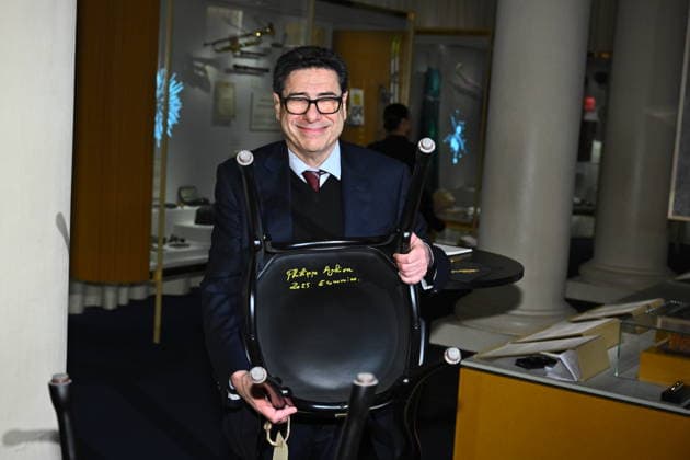 Philippe Aghion, laureate in economics, signs the Nobel chairs at the Nobel Museum in Stockholm, Sweden, December 6, 2025 STOCKHOLM SWEDEN x10090x  Copyright: xClaudioxBresciani TTx NOBEL CHAIRS ARE SIGNED BY THE PRIZE WINNERS ibf_JVicRBg