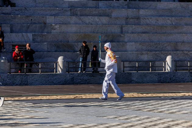 December 6, 2025, Rome, Italia, Italy: 06 12 2025 Rome, The Olympic Torch leaves Rome for the Milan Cortina 2026 Winter Olympics. In the photo, Gregorio Paltrinieri, the first torchbearer of the Milan Cortina 2026 Winter Olympics. Rome Italy  - ZUMAa289 20251206_zia_a289_022 Copyright: xFrancescoxFotiax