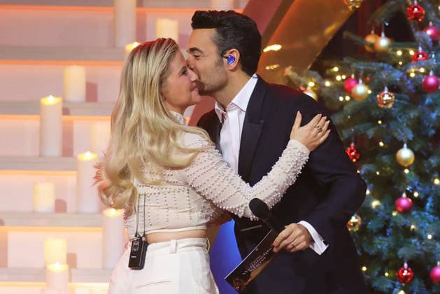 The Great Christmas Show 2025 Presenter Giovanni Zarrella hugs Beatrice Egli Swiss pop singer to welcome her The Great Christmas Show presented by Giovanni Zarrella ZDF Live broadcast from 04 12 2025 in the Baden Arena Offenburg Offenburg, Baden Württemberg, Germany
