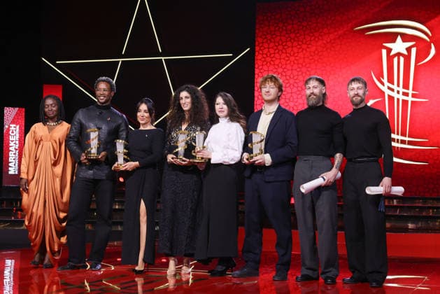 L R Aïssa Maïga, Akinola Davies Jr , Erige Sehiri, Jihan Kikhia, Vladlena Sandu, Oscar Hudson, Elliott Tittensor and Luke Tittensor pose onstage with their prizes during the Closing Ceremony during the 22nd Marrakech International Film Festival 451320 2025 12 06 MARRAKECH Morocco  Copyright: xRomualdxMeigneuxx xStarfacex STAR_451320_121