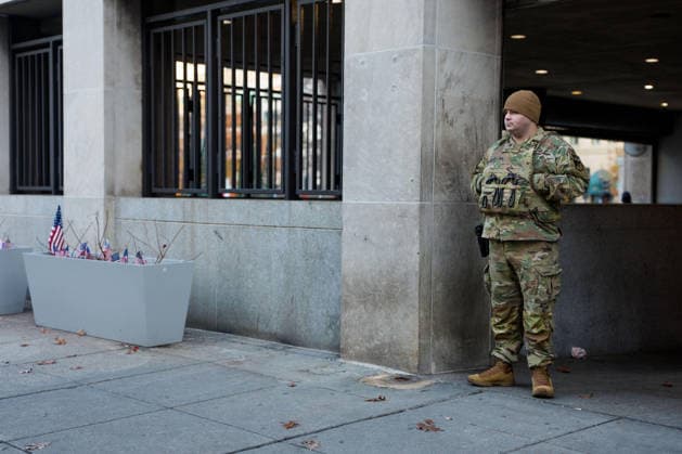 Members of the National Guard patrol near the location of a shooting that killed one National Guard member and left another in critical condition last month outside the Farragut West Metro Station in Washington DC on Sunday, December 7, 2025. A 29-year-old suspect pled not guilty to murder and assault charges earlier this week.  WAP2025120725003 AARONxSCHWARTZ