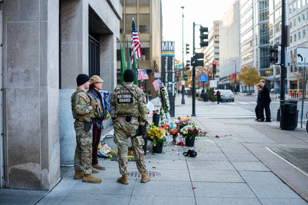 Members of the National Guard patrol near the location of a shooting that killed one National Guard member and left another in critical condition last month outside the Farragut West Metro Station in Washington DC on Sunday, December 7, 2025. A 29-year-old suspect pled not guilty to murder and assault charges earlier this week.  WAP2025120725010 AARONxSCHWARTZ