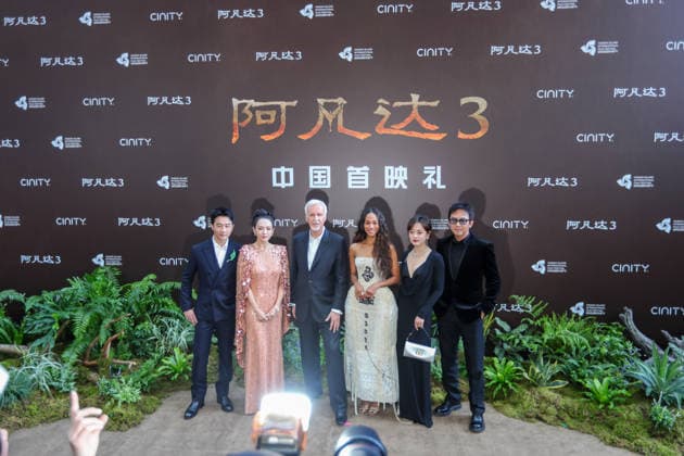 SANYA, CHINA - DECEMBER 08: (L-R) Actor Huang Xuan, actress Zhang Ziyi, director James Cameron, American actress Zoe Saldana, actress Susan Sun Li and actor Deng Chao attend the China premiere of film Avatar: Fire and Ash on December 8, 2025 in Sanya, Hainan Province of China.  Copyright: xChinaxNewsxServicex 111608443904