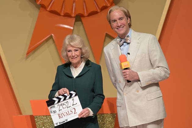 Queen Camilla visits the set of the TV Show Rivals Queen Camilla with Oliver Chris, as she visits the set of the TV Show Rivals in Bristol, UK, on the 8th December 2025. Picture by Anthony Upton WPA-Pool Bristol Bristol United Kingdom  WHA-0806