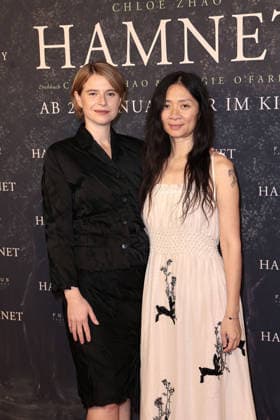 Jessie Buckley and director Chloe Zhao at the Hamnet cinema premiere on 8 12 2025 at the Delphi Filmpalast in Berlin Hamnet film premiere in Berlin