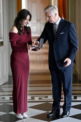 King Philippe presents Nina Derwael with the insignia of Grand Officer of the Order of Leopold BRUSSELS, BELGIUM - DECEMBER 09 : King Philippe presents Nina Derwael with the insignia of Grand Officer of the Order of Leopold. This honorary distinction crowns the exceptional career of the famous Belgian gymnast, notably her titles of Olympic champion (1x), world champion (2x) and European champion (4x) on the uneven bars and balance beam on December 9, 2025 in Brussels, Belgium, 09 12 2025 Brussels Belgium  Copyright: xDidierxLebrunx
