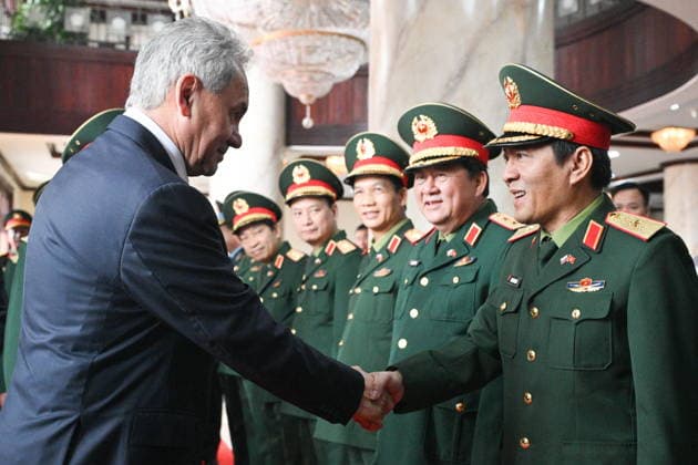 VIETNAM, HANOI - DECEMBER 10, 2025: Russian Security Council Secretary Sergei Shoigu (L) greets an officer before a meeting with Vietnam s Minister of National Defence General Phan Van Giang Hanoi Vietnam  - ZUMAt113 20251210_zaa_t113_086 Copyright: xKirillxZykovx