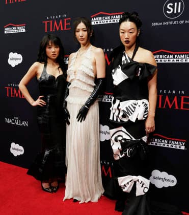 (L-R) Rei Ami, EJAE and Audrey Nuna arrive on the red carpet when TIME Celebrates A Year In TIME at Current at Chelsea Piers on Wednesday, December 10, 2025 in New York City. Rei Ami, EJAE, and Audrey Nuna are the vocalists behind the fictional K-Pop girl group HUNTR X in the popular Netflix animated musical movie K-Pop Demon Hunters.  NYP20251210102 JohnxAngelillo