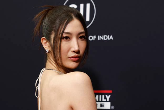 EJAE arrives on the red carpet when TIME Celebrates A Year In TIME at Current at Chelsea Piers on Wednesday, December 10, 2025 in New York City. Rei Ami, EJAE, and Audrey Nuna are the vocalists behind the fictional K-Pop girl group HUNTR X in the popular Netflix animated musical movie K-Pop Demon Hunters.  NYP20251210114 JohnxAngelillo