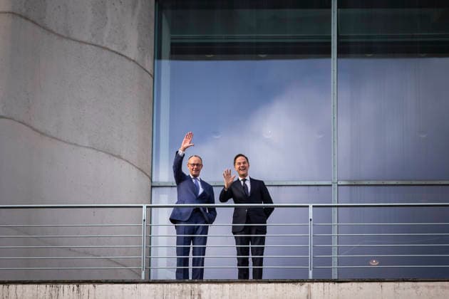 L R Friedrich Merz CDU , Federal Chancellor, and Mark Rutte, Secretary General of NATO during a meeting on the balcony of the Federal Chancellery in Berlin, 11 12 2025 Berlin Germany Copyright: xAmreixSchulzx