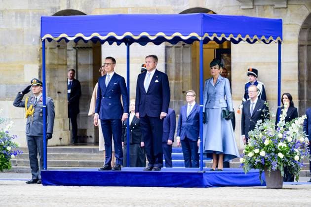 Amsterdam, The Netherlands, 2025-12-11 10:27:50 AMSTERDAM, 11-12-2025, Dam Square. State visit of the President of Finland, Alexander Stubb, to the Netherlands. He is accompanied by his wife, Suzanne Innes-Stubb. King Willem-Alexander and Queen Maxima officially welcome the Finnish President and Mrs. Innes-Stubb on Dam Square in Amsterdam. PHOTO: NLBeeld Patrick van Emst Credit: NL Beeld Patrick van Emst  Copyright: xx x