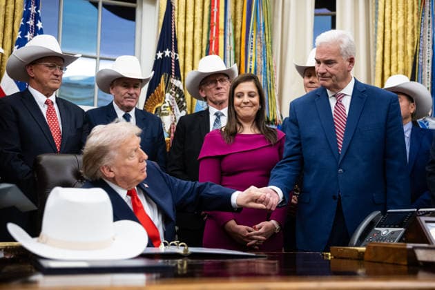 President Donald Trump shakes hands with Rep. Tom Emmer (R-Minn.) during a bill signing to award Congressional Gold Medals to the 1980 U.S. Olympic ice hockey team in the Oval Office at the White House in Washington, DC on Friday, December 12, 2025.  WAX20251212251 FrancisxChung
