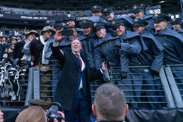December 13, 2025, Baltimore, Maryland, USA: Secretary of the Army DAN DRISCOLL poses for a selfie with Army cadets at the Army Navy Game. Baltimore USA - ZUMAs365 20251213_znp_s365_002 Copyright: xJoeyxSussmanx
