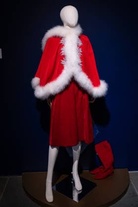 Sotheby s Icons and Bing Crosby Exhibitions press preview Kathryn Crosby Jean Louis Bespoke Christmas ensemble, part of Kathryn & Bing Crosby collection on view during press preview at Sotheby s Icons and Bing Crosby Exhibitions in New York, NY on December 13, 2025. New York New York United States Copyright: LevxRadin