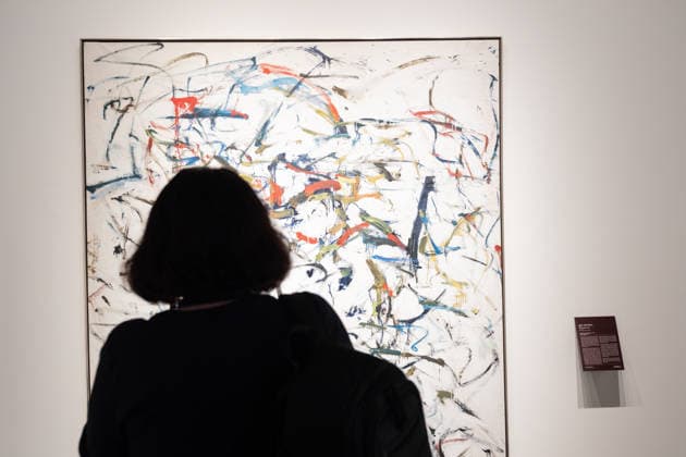 Sotheby s Icons and Bing Crosby Exhibitions press preview A visitor examines Joan Mitchell King of Spades sold for almost 3 million dollars on view during press preview at Sotheby s Icons and Bing Crosby Exhibitions in New York, NY on December 13, 2025. New York New York United States Copyright: LevxRadin