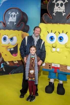 ABBberlin Frida Korittke and Oliver Korittke father and daughter as guests on the yellow carpet at the German premiere of SPONGEBOB SCHWAMMKOPF PIRATEN AHOI at the cinema in the Kulturbrauerei on 14 12 2025 Berlin Germany