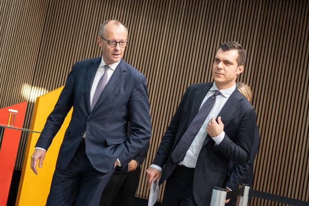 Federal Chancellor Friedrich Merz, left, with his personal advisor Tim Lienemann, after the Federal Executive Committee meeting at the Konrad Adenauer Haus CDU Deutschlands Bundesvorstandssitzung , Berlin Berlin Germany Konrad Adenauer Haus