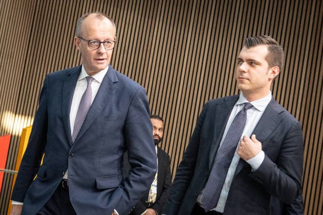 Federal Chancellor Friedrich Merz, left, with his personal advisor Tim Lienemann, after the Federal Executive Committee meeting at the Konrad Adenauer Haus CDU Deutschlands Bundesvorstandssitzung , Berlin Berlin Germany Konrad Adenauer Haus
