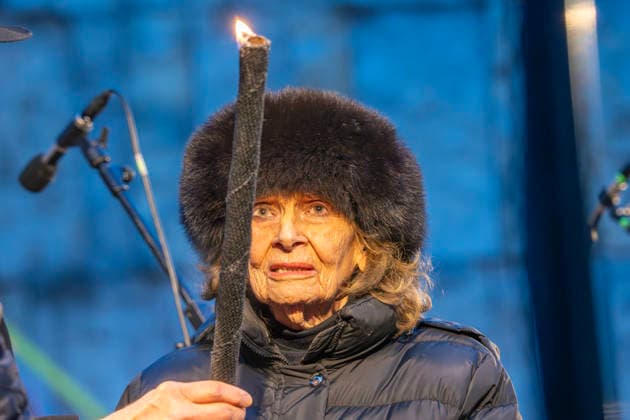 Charlotte Knobloch, 93, with the Hanukkah light, lighting the Hanukkah lights in front of the synagogue on Jakobsplatz, Munich, December 15, 2025 Germany, Munich December 15, 2025, Charlotte Knobloch, 93, President of the Jewis