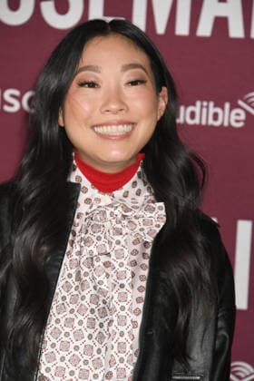 HOLLYWOOD, CA - DECEMBER 15: Awkwafina at the Los Angeles premiere of The Housemaid on December 15, 2025 at the TCL Chinese Theater in Hollywood, California. Copyright: xJeffreyxMayerx