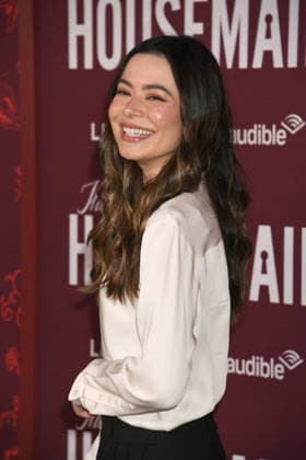HOLLYWOOD, CA - DECEMBER 15: Miranda Cosgrove at the Los Angeles premiere of The Housemaid on December 15, 2025 at the TCL Chinese Theater in Hollywood, California. Copyright: xJeffreyxMayerx