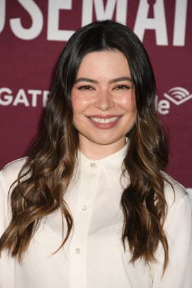 HOLLYWOOD, CA - DECEMBER 15: Miranda Cosgrove at the Los Angeles premiere of The Housemaid on December 15, 2025 at the TCL Chinese Theater in Hollywood, California. Copyright: xJeffreyxMayerx