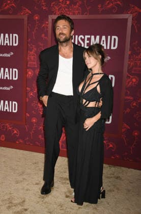 HOLLYWOOD, CA - DECEMBER 15: Brandon Sklenar and Courtney Salviolo at the Los Angeles premiere of The Housemaid on December 15, 2025 at the TCL Chinese Theater in Hollywood, California. Copyright: xJeffreyxMayerx