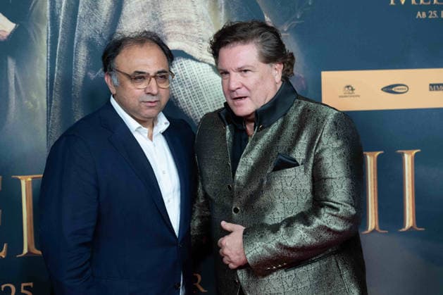 f l Walid NAKSCHBANDI, Head of Film und Medienstiftung NRW, Francis FULTON SMITH, actor, portrait, portrait, portrait, cropped single image, single motif, red carpet, red carpet show, arrival, arrival, film premiere DER MEDICUS 2 on 15 12 2025 at the Cinedom cinema in Cologne,