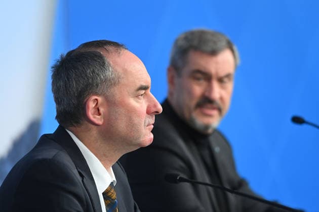 from left Hubert AIWANGER Freie Waehler,Minister of Economic Affairs Bavaria,Markus SOEDER Ministerpraesident Bavaria and CSU Chairman,single picture,cropped single motif,portrait,portrait press conference of the Bavarian State Government after cabinet meeting on 16 12 2025 in Prinz Carl Palais in Munich