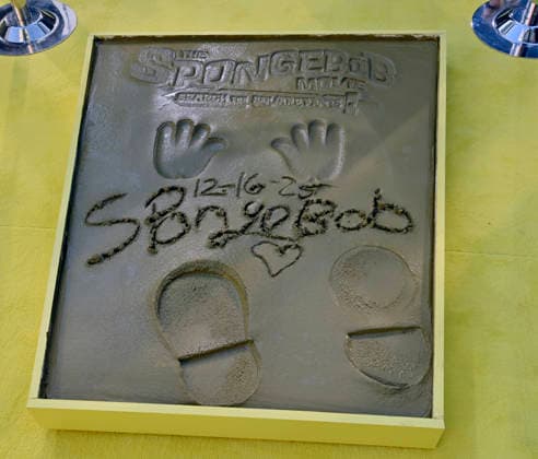 SpongeBobs hands and footprints are on display following a ceremony immortalizing SpongeBob in the forecourt of the TCL Chinese Theatre (formerly Grauman s) in the Hollywood section of Los Angeles on Tuesday, December 16, 2025.  LAP20251216418 JIMxRUYMEN