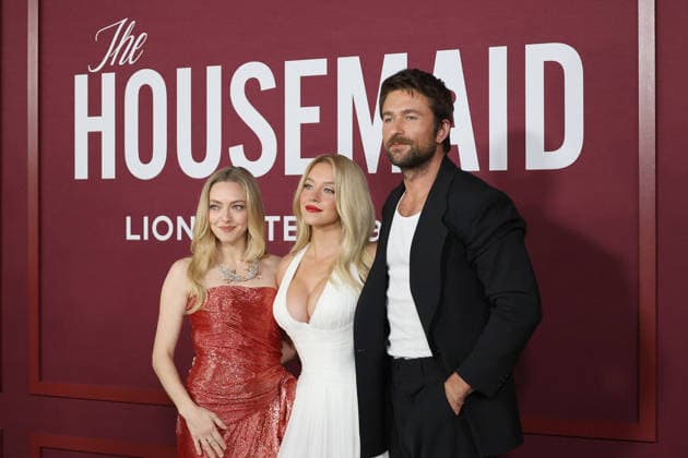 December 15, 2025, Los Angeles, California, USA: Amanda Seyfried, Sydney Sweeney, Brandon Sklenar at the Premiere of The Housemaid at the TCL Chinese Theatre IMAX Los Angeles USA - ZUMAg107 20251215_zep_g107_016 Copyright: xNinaxPrommerx