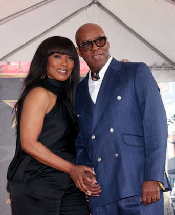Angela Bassett and Courtney B. Vance attend an unveiling ceremony honoring Courtney B. Vance with the 2,831st star on the Hollywood Walk of Fame in Los Angeles on Tuesday, December 16, 2025.  LAP20251216824 GREGxGRUDT