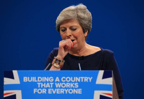 British Conservative Party Annual Conference 2017 MANCHESTER, UNITED KINGDOM - OCTOBER 04: British Prime Minister and leader of the Conservative Party Theresa May MP stops to cough as she loses her voice during her keynote speech on the final day of the annual Conservative Party Conference in Manchester, north west England on October 04, 2017. Manchester Ingiltere. Editorial use only. Please get in touch for any other usage.  Copyright: x2025xAnadoluxLindseyxParnabyx