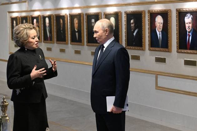 Russia Putin Parliament 9079176 24.12.2025 Russian President Vladimir Putin and Federation Council speaker Valentina Matvienko talk before a session at the Federation Council, the Upper House of the Russian Parliament, in Moscow, Russia. Dmitriy Duhanin Sputnik Moscow Russia Copyright: xDmitriyxDuhaninx